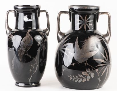 Suite of two eglomised glass vases with handles,...