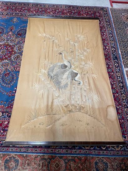 A hanging in fabric and silk relief, depicting...