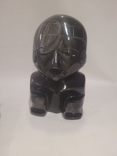 Un lot comprenant un masque et une statuette...
