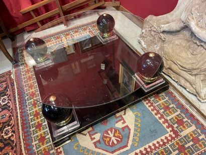 ROCHE BOBOIS. Coffee table with a black Plexiglas...
