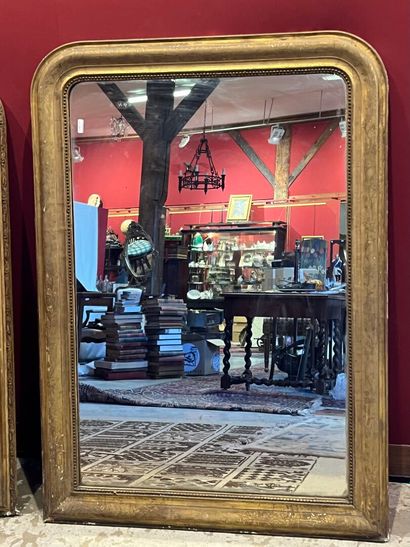 Un miroir de style Louis Philippe doré, ...