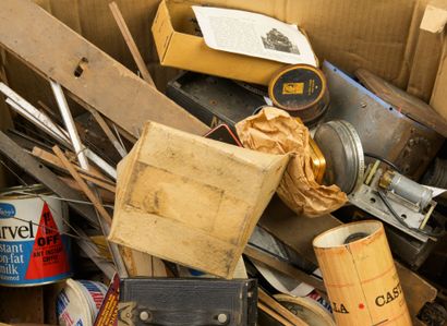 Set of parts in boxes, wheels, screws, and...