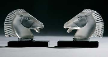 Lalique
Paire de serres livres modèle «Longchamp»...