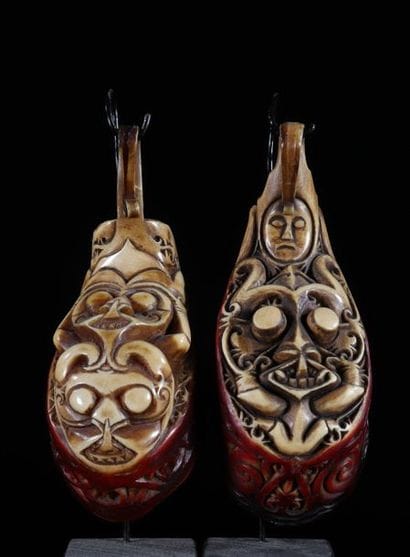 Curiosity lot of 2 carved hornbill jewelry...