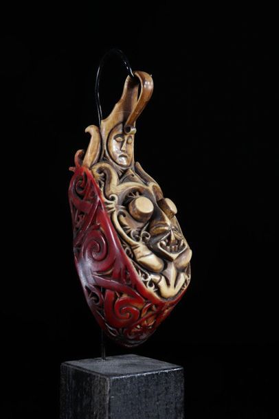 Curiosity lot of 2 carved hornbill jewelry...