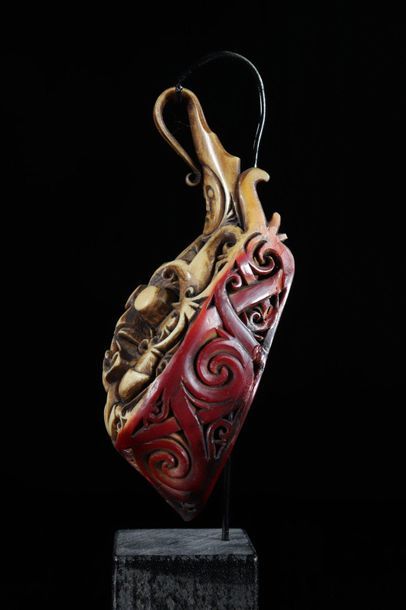 Curiosity lot of 2 carved hornbill jewelry...