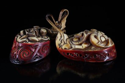 Curiosity lot of 2 carved hornbill jewelry...