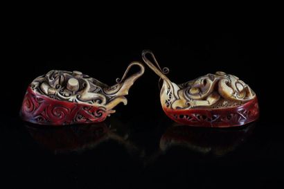 Curiosity lot of 2 carved hornbill jewelry...