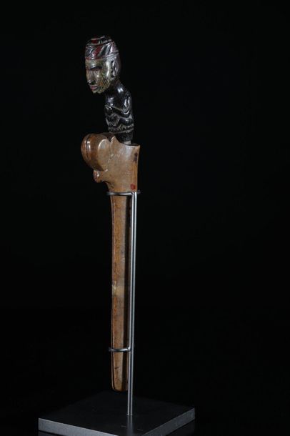 Asia knife and wooden scabbard carved with...