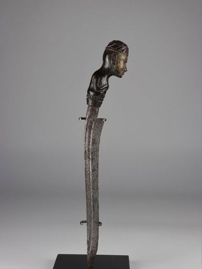 Asia knife and wooden scabbard carved with...
