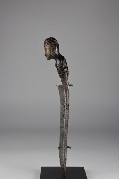Asia knife and wooden scabbard carved with...