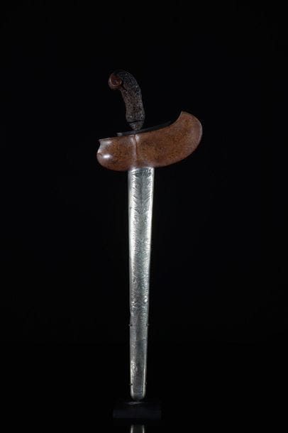 Asia knife (Kriss) in carved wood and its...