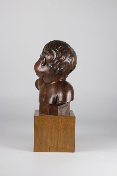 Europe Wooden sculpture bust of a child on...