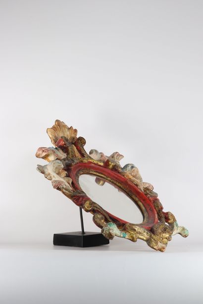 Miroir de style Rococo en bois polychrome
Dimensions:...