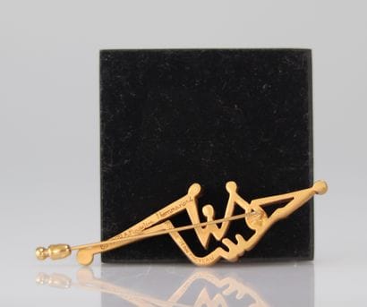 Jean Cocteau. 1999. Profil d’homme. Broche...