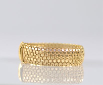 Bracelet en or jaune (18k) mailles tressées...