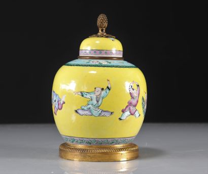 Potiche covered with yellow background decorated...