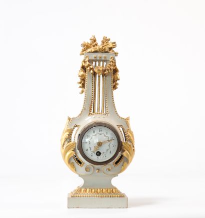 Louis XVI style wooden clock. Nineteenth...
