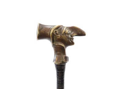Cane with grotesque bonze pommel
Weight:...