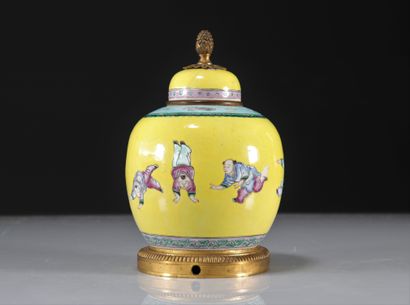 Potiche covered with yellow background decorated...