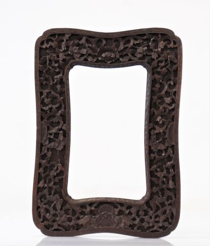 Chinese carved wooden frame decorated with...