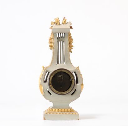 Louis XVI style wooden clock. Nineteenth...