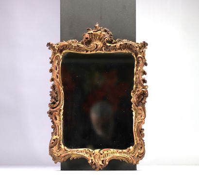 Mirroir de style rocaille en bois doré à...