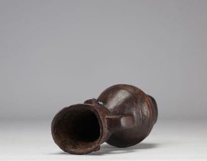 Verseuse Mangbetu en bois sculpté RDC.
Poids:...