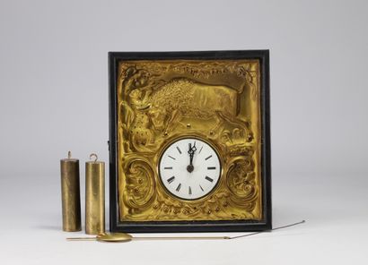 Wall clock in repoussé brass with buffalo...