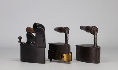 Set of three antique irons with wooden handles
Weight:...