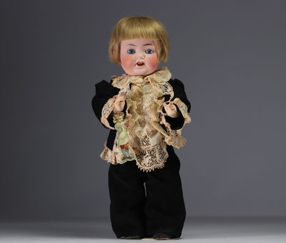 HEUBACH - Bébé caractère tête en biscuit...