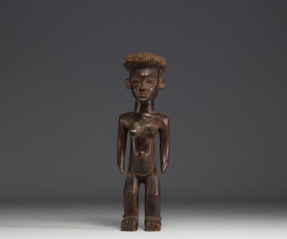 RDC - Statuette féminine Chokwé en bois sculpté.
Poids:...