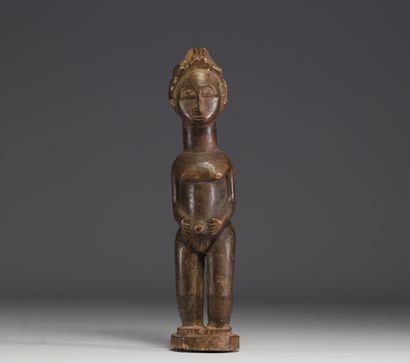 RDC - Statuette féminine Iwena en bois sculpté.
Poids:...