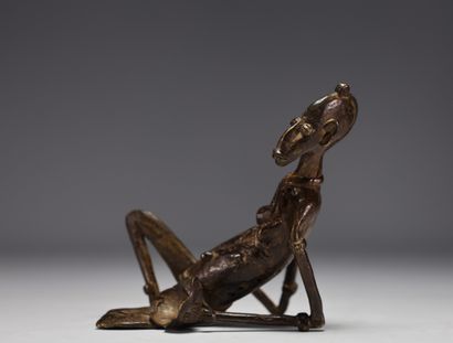 Mali - Personnage en bronze sculpté.
Poids:...