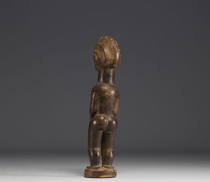 RDC - Statuette féminine Iwena en bois sculpté.
Poids:...