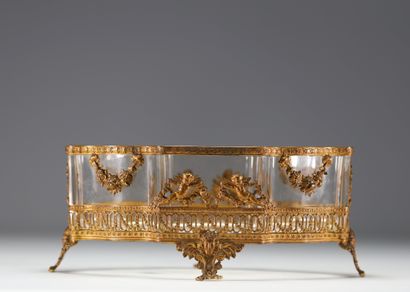 Jardinière en bronze doré et ciselé à décor...
