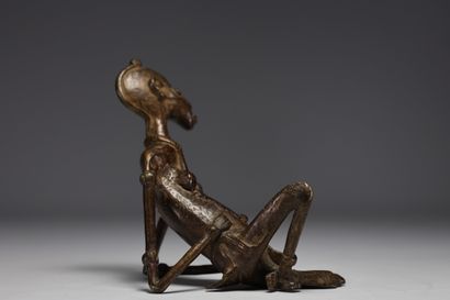 Mali - Personnage en bronze sculpté.
Poids:...