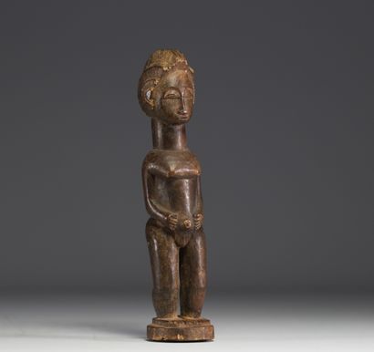 RDC - Statuette féminine Iwena en bois sculpté.
Poids:...