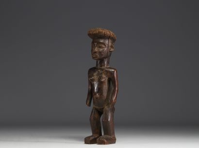 RDC - Statuette féminine Chokwé en bois sculpté.
Poids:...