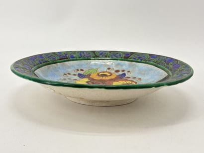 Charles CATTEAU (1880-1966). Grand plat creux...