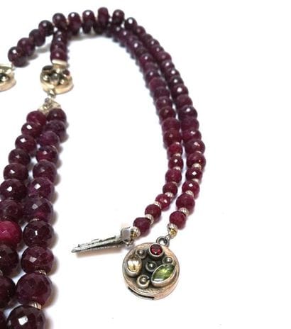 COLLIER composé de perles rondelles facettées...