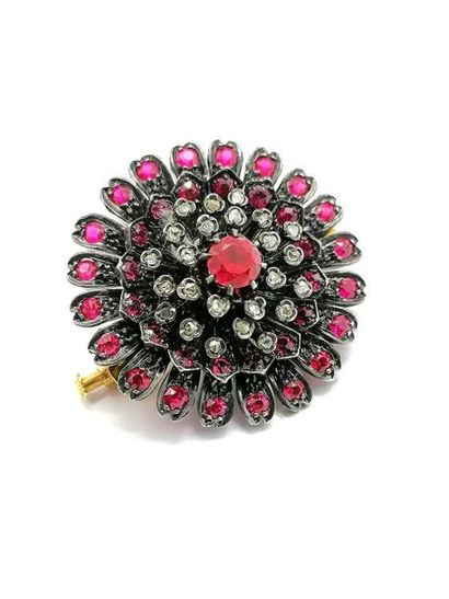 BROCHE en or jaune18K (750/°°), et argent...