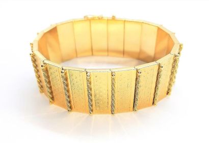BRACELET manchette ruban en or jaune 18K...