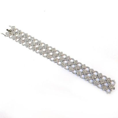 BRACELET large articulé en or gris 14k (585/°°)...
