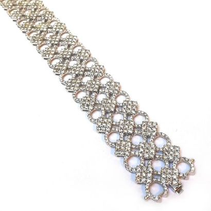 BRACELET large articulé en or gris 14k (585/°°)...