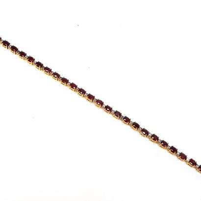 BRACELET articulé en argent doré (vermeil)...