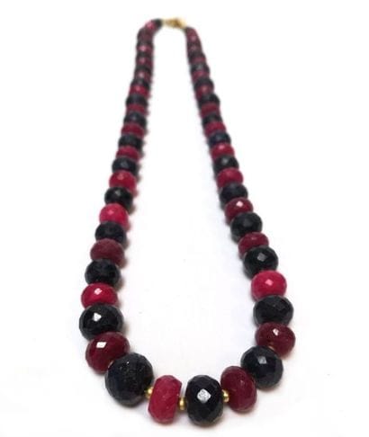COLLIER composé de perles rondelles facettées...