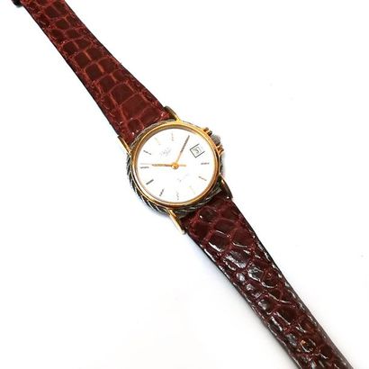 FRED Bracelet montre de dame en métal doré...