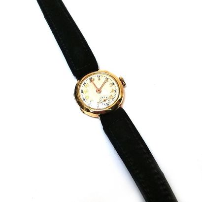 MONTRE de dame en or jaune 750°/°°, cadran...