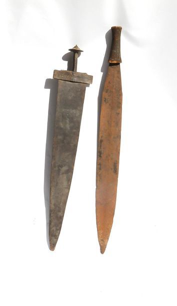 Two dance swords

One with a triangular blade,...